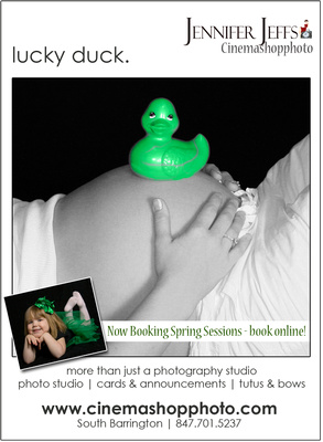maternity belly holding rubber duck